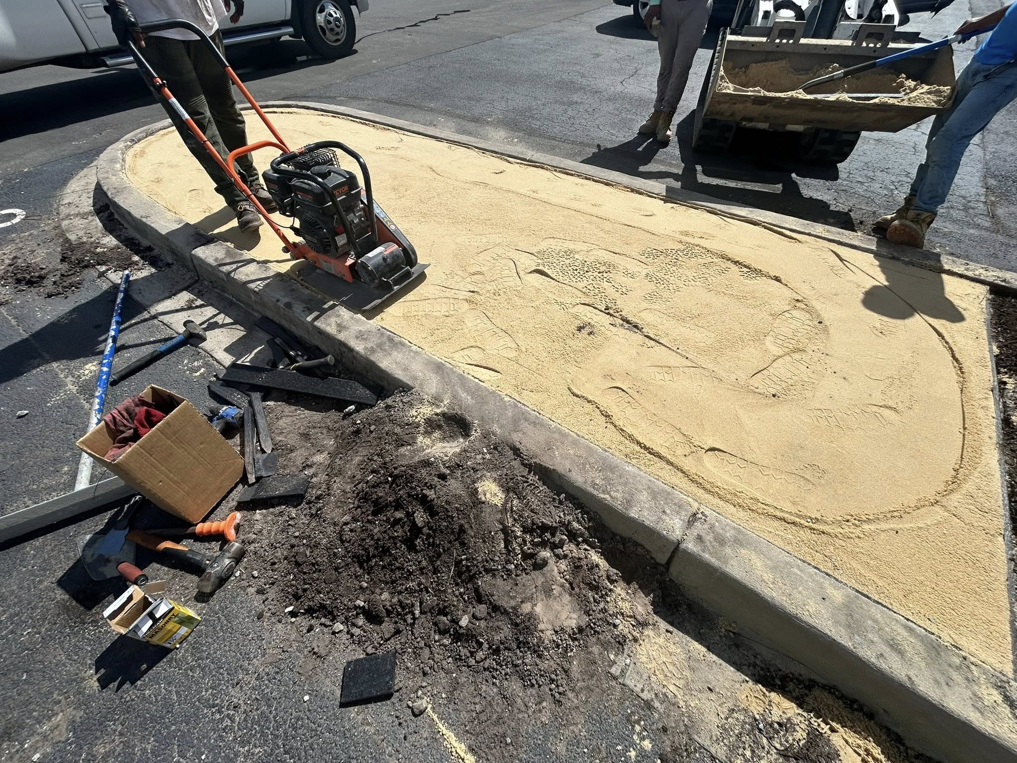 Removed shrubs, and installed artificial turf for dealership