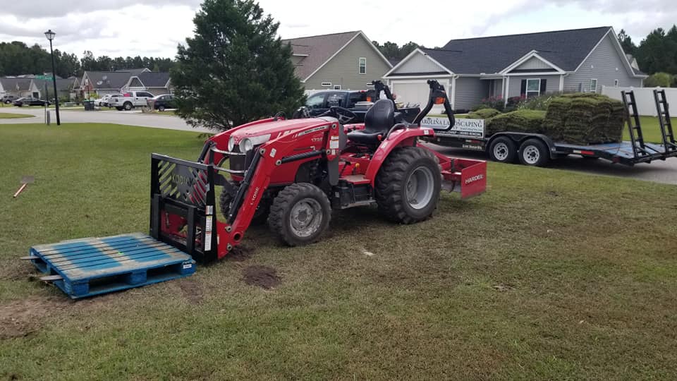 Removed old grass, old sand area, installed top soil, sod Longs, SC 29568