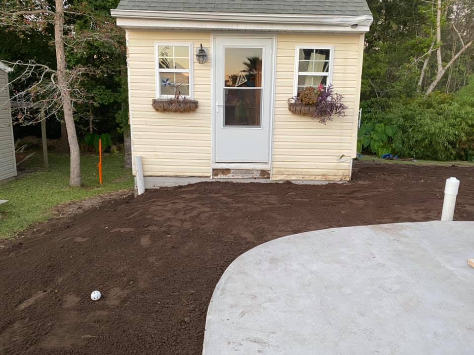 Brought in 5 dump truck loads of fill to prep for sod in Little River, SC 29566