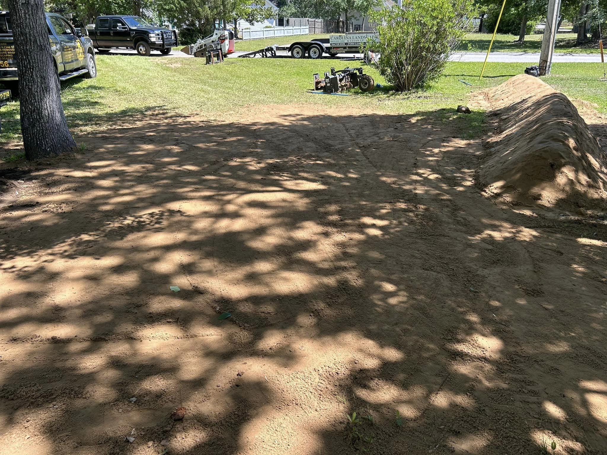 Raise and grade ground, install berms,plants and sod in North Myrtle Beach,SC 29582