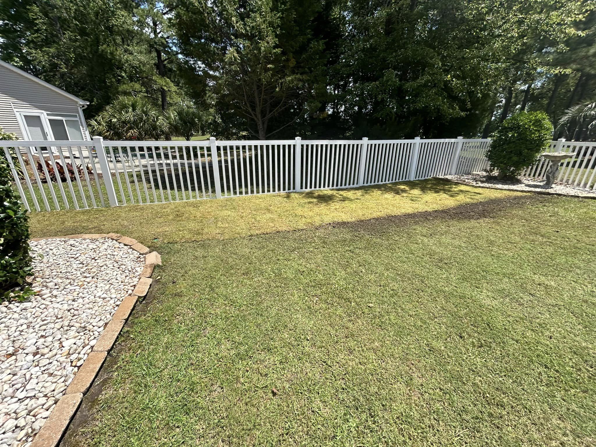 Removed old grass, added soil and installed Bermuda sod down in Little River,SC 29566