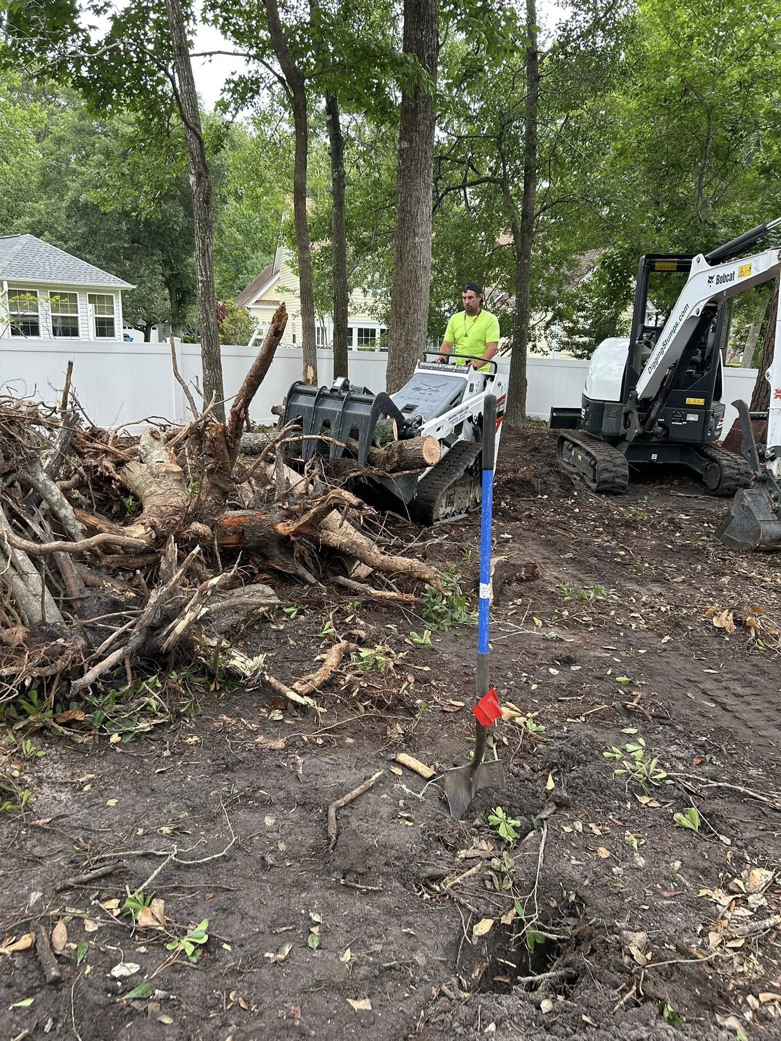 Removed 20 trees, trimmed 20 trees, added soil and installed high end St. Augutine in Little River,SC 29566