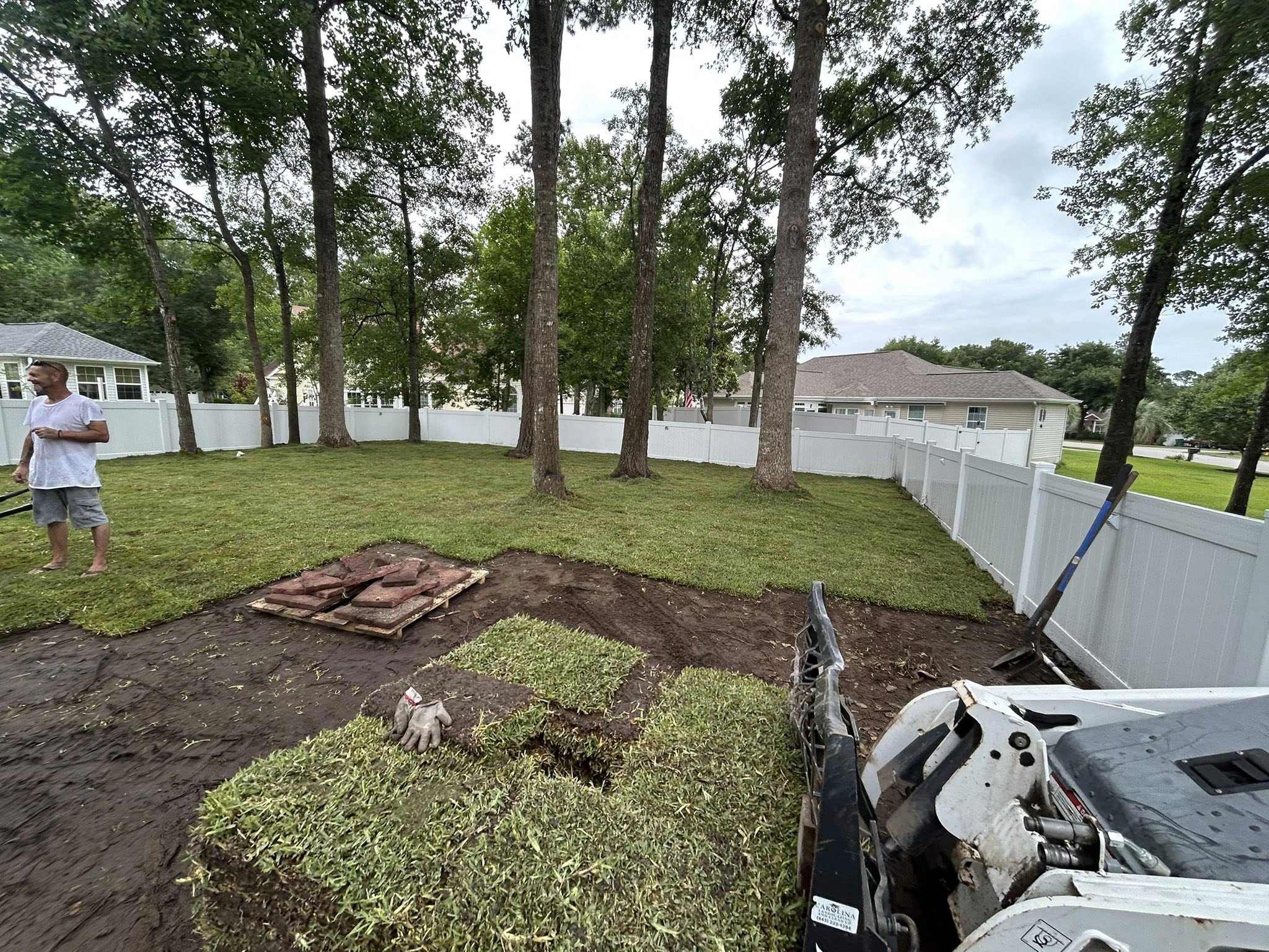 Removed 20 trees, trimmed 20 trees, added soil and installed high end St. Augutine in Little River,SC 29566