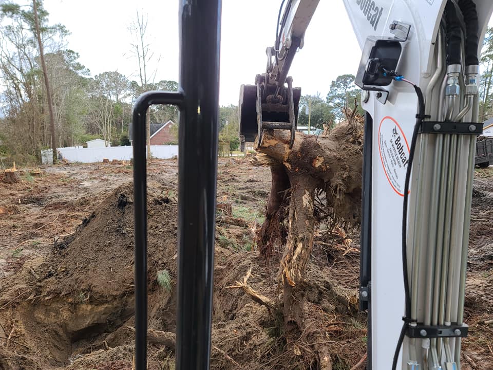 Assisted our buddies company digging stumps for land clearing in Calabash, NC